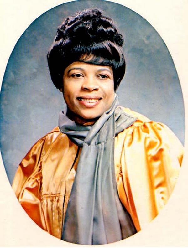 Dr. Clark in gold robe