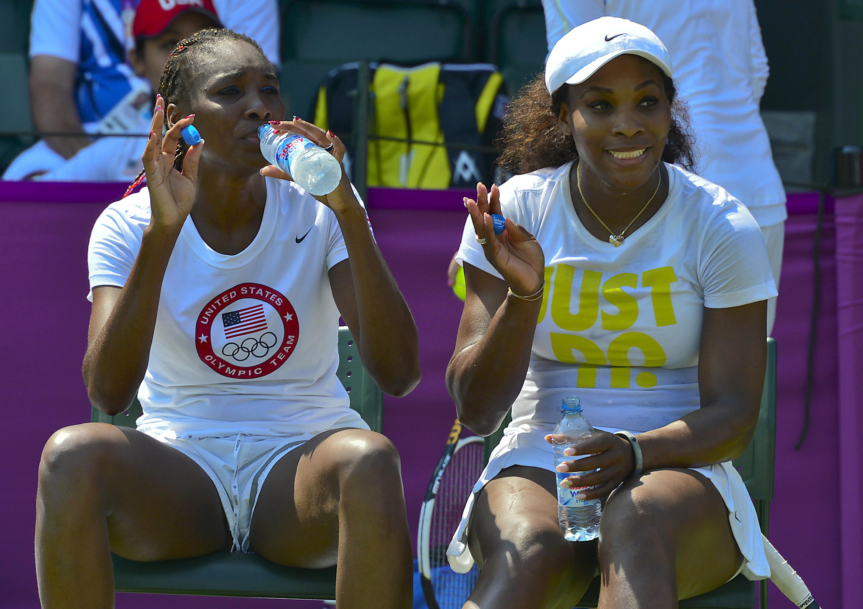 US tennis players Venus Williams (L) and