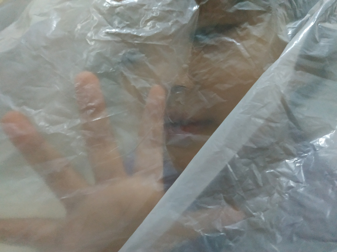 Little Girl Inside Plastic